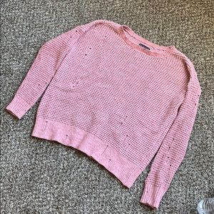 Pink knitted sweater